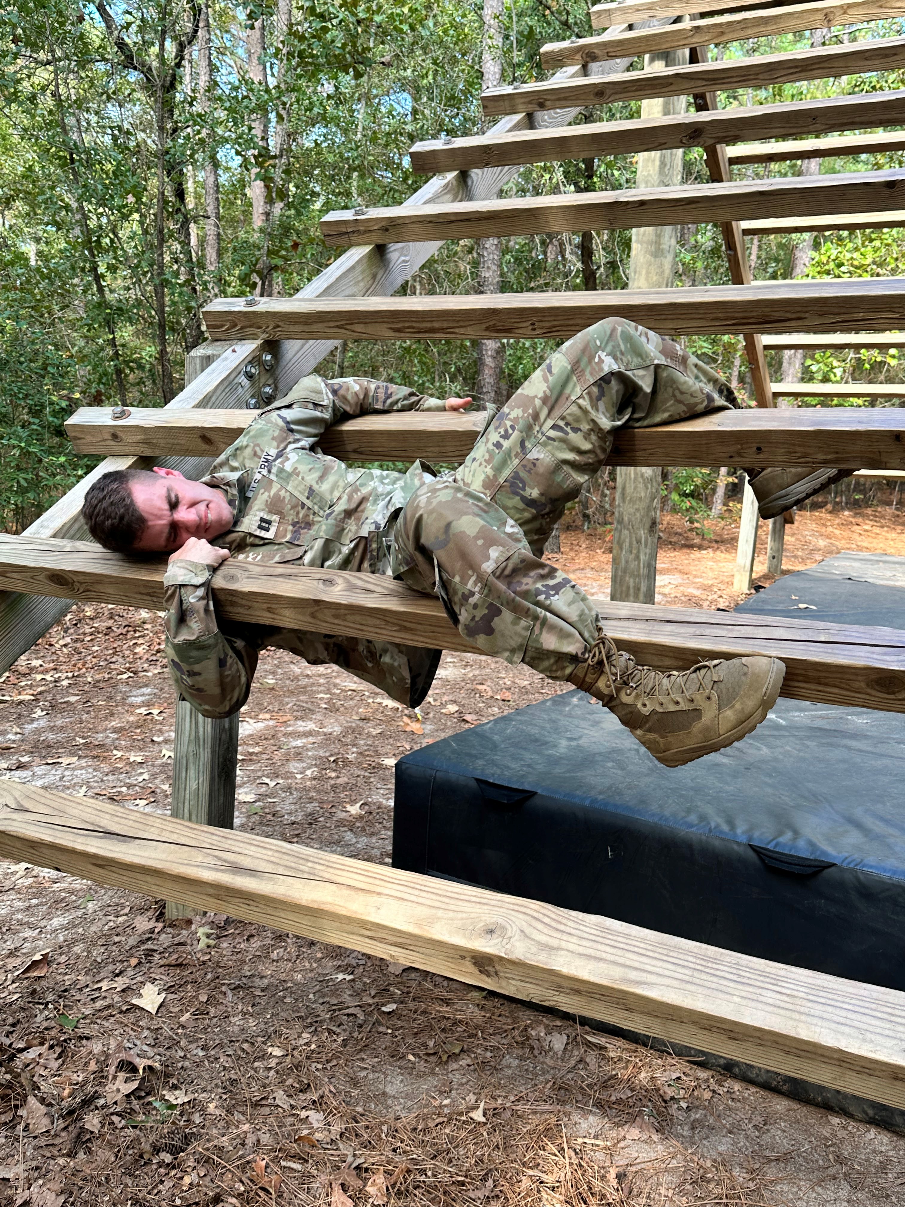 CPT Nicastro tackling the weaver at the All American Mile Obstacle Course Photo Credit: SSG Wolfington